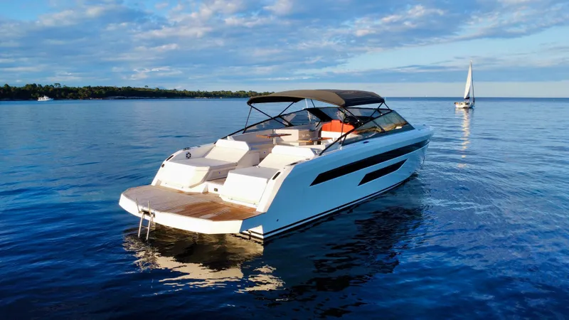 Ischia Yacht Photos Pics 2024 BB Yachts 44 Ischia cruising on calm waters under a blue sky.