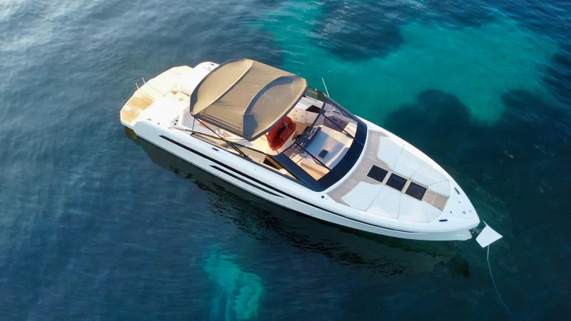 Ischia Yacht Photos Pics 2024 BB Yachts 44 Ischia luxury yacht on clear blue water.