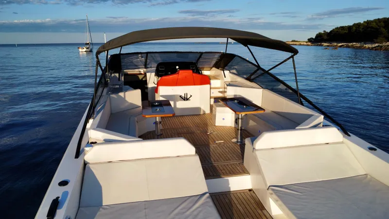 Ischia Yacht Photos Pics 2024 BB Yachts 44 Ischia luxury yacht with spacious deck and seating on calm waters.