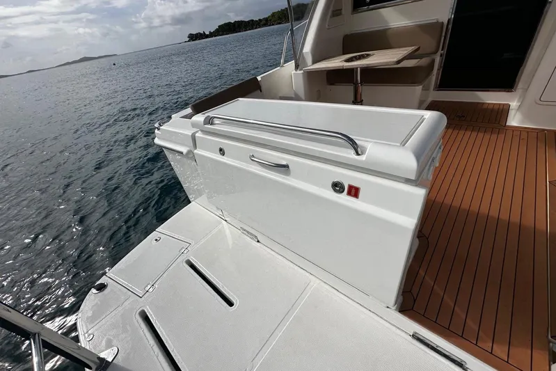  Yacht Photos Pics 2020 Riviera 395 SUV yacht deck with seating and ocean view.