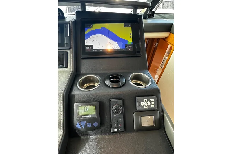  Yacht Photos Pics 2020 Riviera 395 SUV dashboard with navigation screen and control panel.