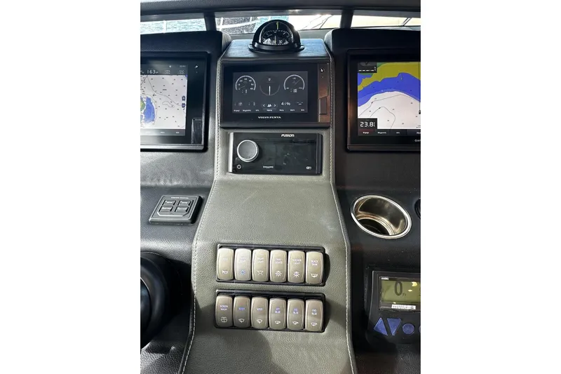  Yacht Photos Pics Dashboard of 2020 Riviera 395 SUV with navigation screens and control panel.