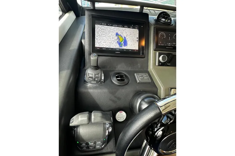  Yacht Photos Pics Cockpit of 2020 Riviera 395 SUV with navigation display and controls.