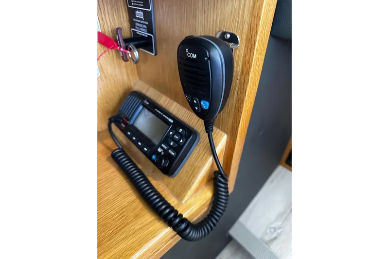  Yacht Photos Pics Radio communication device on 2020 Riviera 395 SUV boat dashboard.