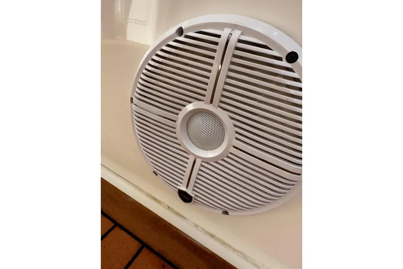  Yacht Photos Pics White speaker grille on 2020 Riviera 395 SUV boat interior.