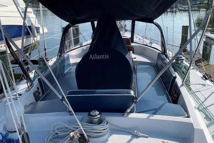 Hylas 44 sailboat cockpit, 1990 model, docked with covered seating and winch.
