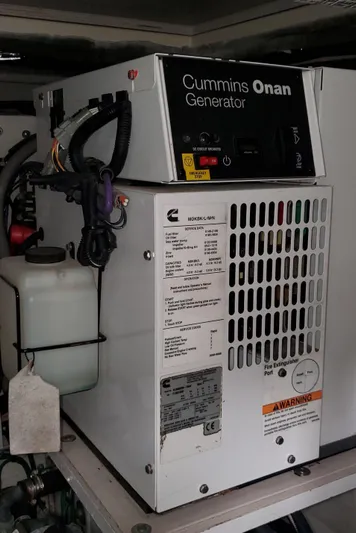 Never Again Yacht Photos Pics Cummins Onan generator in a 2012 Sea Ray 450 Sedan Bridge yacht.