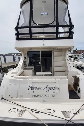 Never Again Yacht Photos Pics 2012 Sea Ray 450 Sedan Bridge yacht docked, featuring "Never Again" nameplate, Providence, RI.