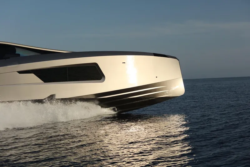 Maori 64 Yacht Photos Pics Maori 64 Yacht 2026 cruising on the sea at sunset.