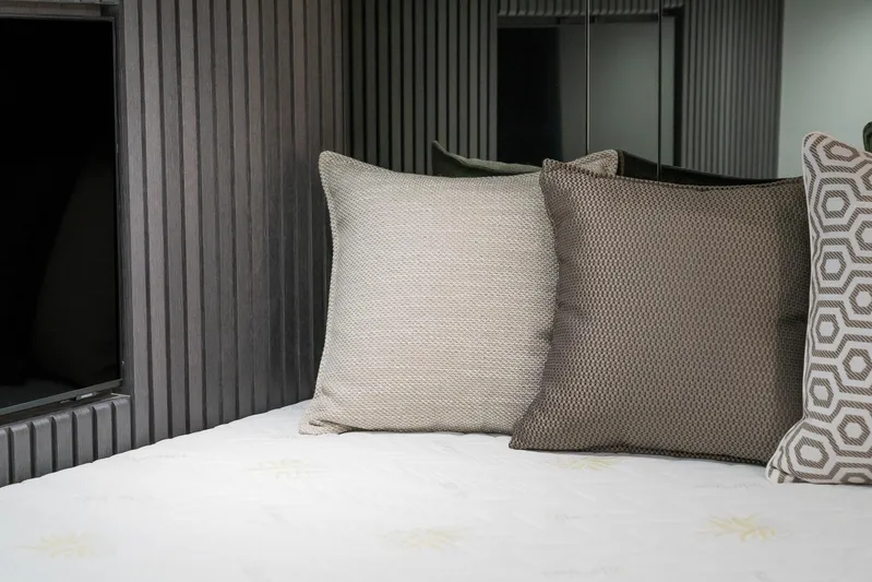 Maori 64 Yacht Photos Pics Modern pillows on bed in Maori 64 yacht, 2026 model.