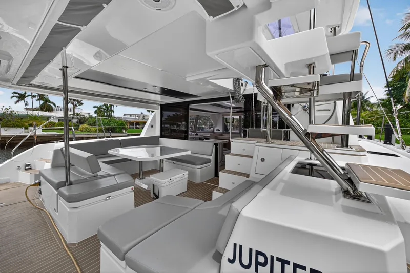 Sundecker Yacht Photos Pics Modern 2021 Leopard 45 yacht interior with sleek seating and dining area.