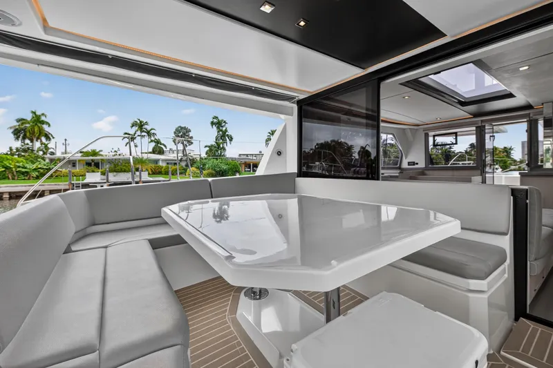 Sundecker Yacht Photos Pics Luxurious 2021 Leopard 45 yacht interior with sleek seating and modern design.