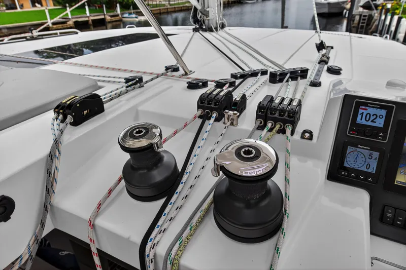 Sundecker Yacht Photos Pics Sailing yacht deck with winches and control panels, Leopard 45, 2021 model.