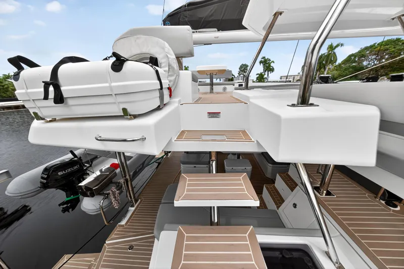 Sundecker Yacht Photos Pics Modern Leopard 45 yacht deck with wooden steps and outdoor equipment, 2021 model.