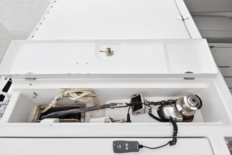 Sundecker Yacht Photos Pics Anchor compartment of 2021 Leopard 45 yacht with winch and rope.