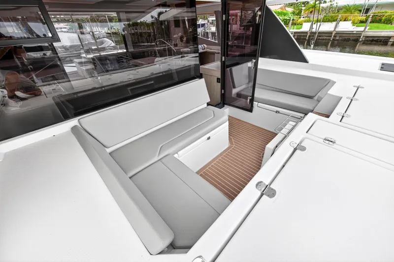 Sundecker Yacht Photos Pics Luxurious seating area on 2021 Leopard 45 yacht with modern design and spacious layout.