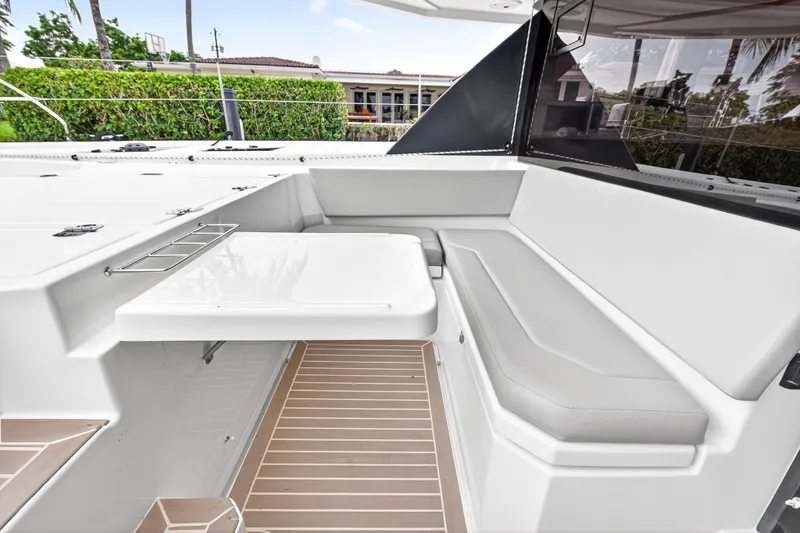 Sundecker Yacht Photos Pics Luxurious seating area on a 2021 Leopard 45 catamaran, featuring sleek design and modern amenities.