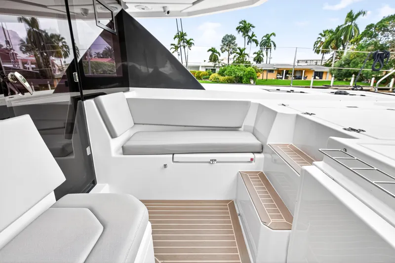 Sundecker Yacht Photos Pics 2021 Leopard 45 yacht interior with sleek seating and modern design.
