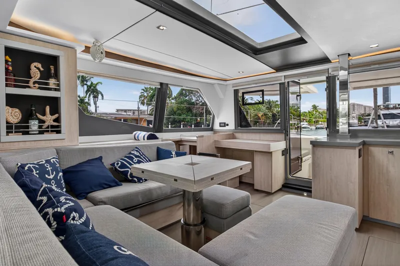 Sundecker Yacht Photos Pics Luxurious interior of 2021 Leopard 45 yacht with modern seating and decor.