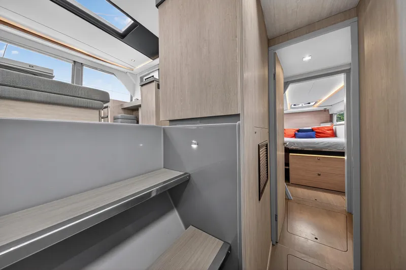 Sundecker Yacht Photos Pics Modern interior of 2021 Leopard 45 yacht with sleek design and cozy bedroom.