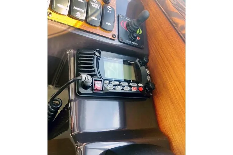  Yacht Photos Pics Control panel of 2021 Ranger Tugs R-25 with radio and thruster controls.