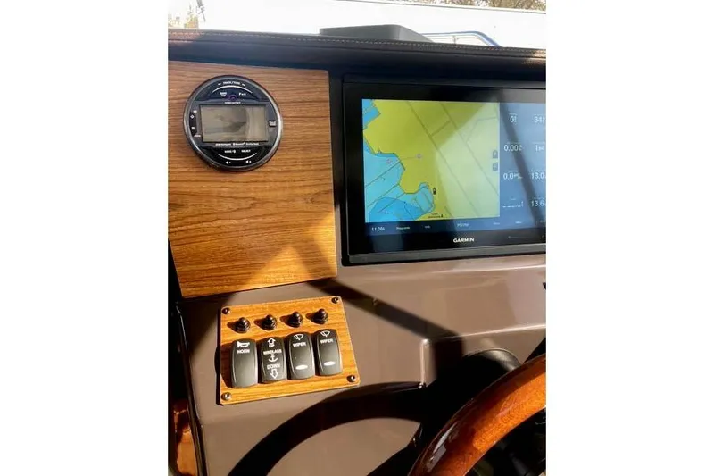  Yacht Photos Pics 2021 Ranger Tugs R-25 dashboard with Garmin navigation and control panel.