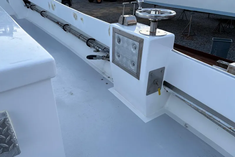 Yacht Photos Pics 1994 Custom Workboat deck with steering wheel and control panel.