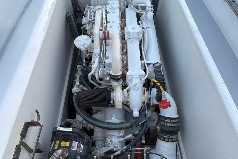  Yacht Photos Pics Engine compartment of a 1994 Custom Workboat, showcasing detailed mechanical components.