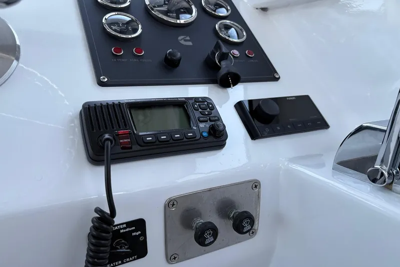  Yacht Photos Pics Control panel of a 1994 Custom Workboat with radio and gauges.