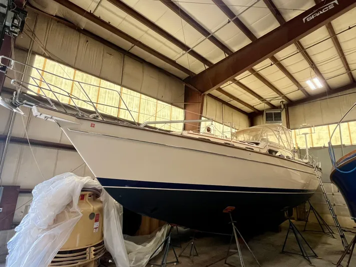 Intrepid II Yacht Photos Pics 2008 Island Packet 465 sailboat in indoor storage, elevated on stands.