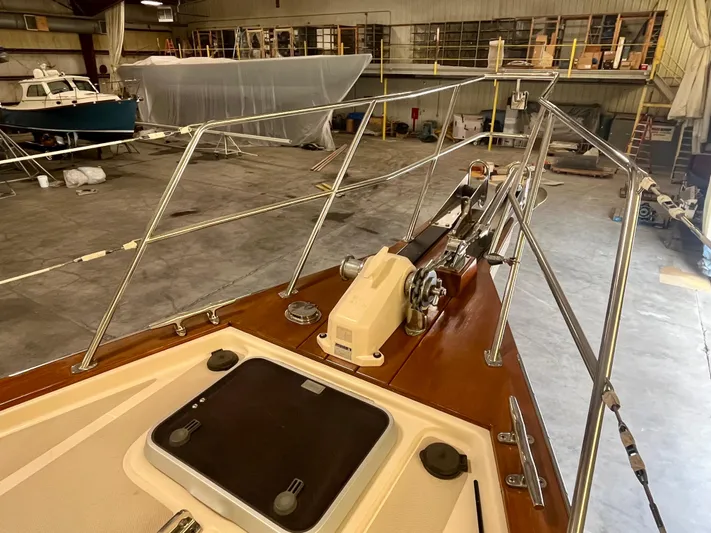 Intrepid II Yacht Photos Pics 2008 Island Packet 465 sailboat deck with railing in a storage facility.