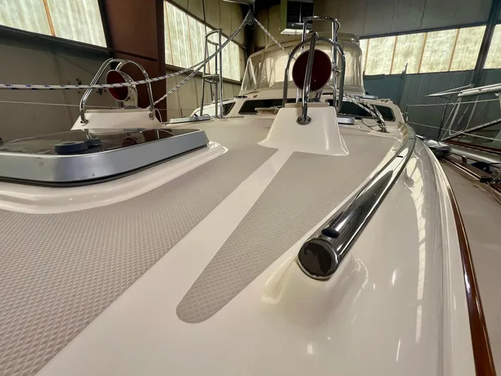 Intrepid II Yacht Photos Pics 2008 Island Packet 465 yacht deck, showcasing sleek design and polished fittings in a well-lit indoor setting.