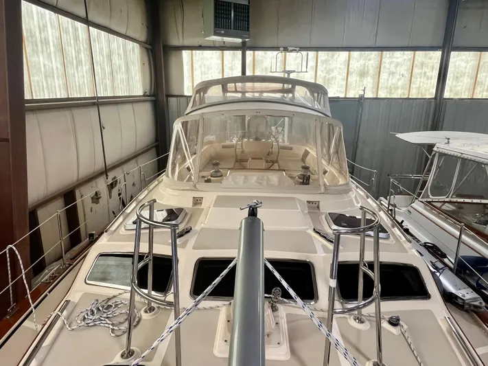 Intrepid II Yacht Photos Pics 2008 Island Packet 465 yacht in indoor storage, showcasing deck and cockpit features.