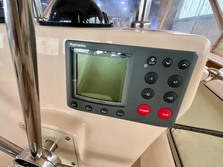 Intrepid II Yacht Photos Pics Raymarine navigation system on 2008 Island Packet 465 yacht, featuring control buttons and display.