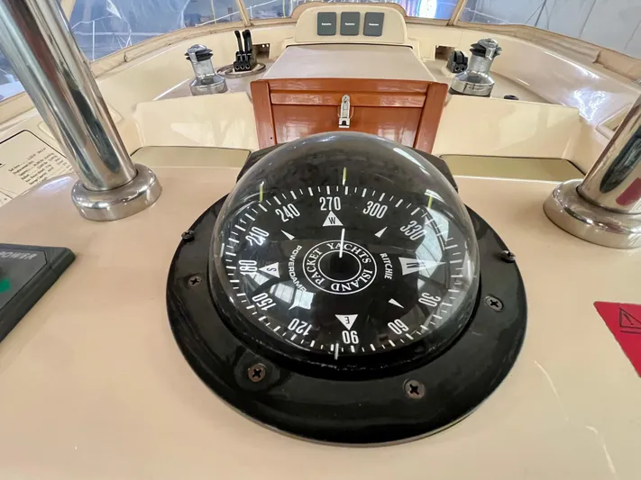 Intrepid II Yacht Photos Pics Compass on 2008 Island Packet 465 yacht's helm, showcasing navigation equipment.