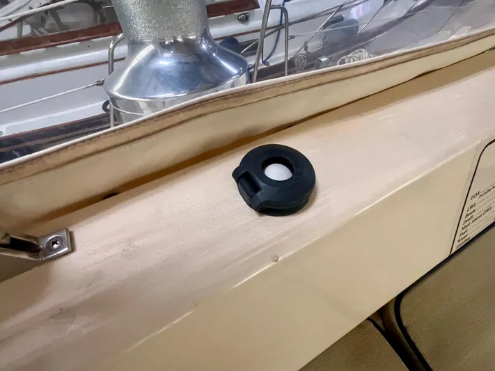 Intrepid II Yacht Photos Pics 2008 Island Packet 465 yacht deck with a black circular fitting.