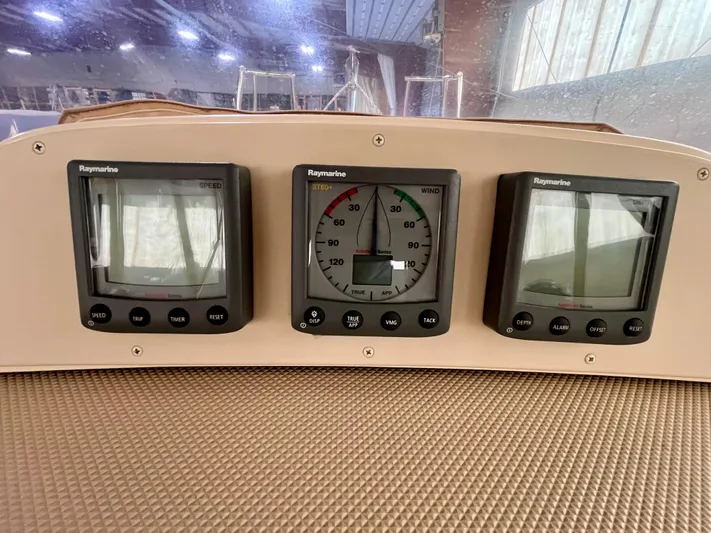 Intrepid II Yacht Photos Pics Raymarine instruments on 2008 Island Packet 465 yacht dashboard, displaying speed, wind, and depth.