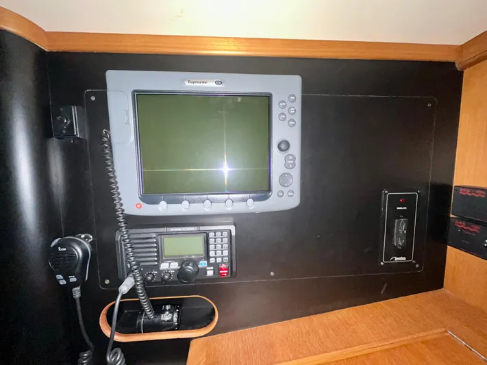 Intrepid II Yacht Photos Pics Navigation equipment on 2008 Island Packet 465 sailboat, featuring Raymarine display and communication devices.