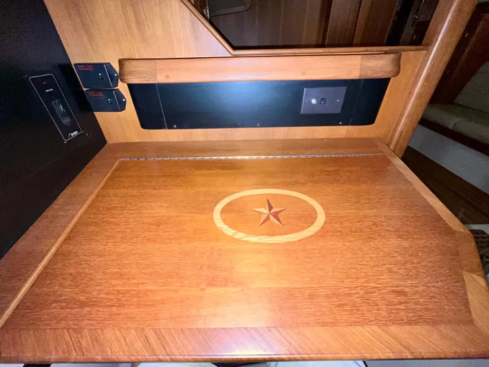 Intrepid II Yacht Photos Pics Wooden interior detail of a 2008 Island Packet 465 yacht with star inlay design.