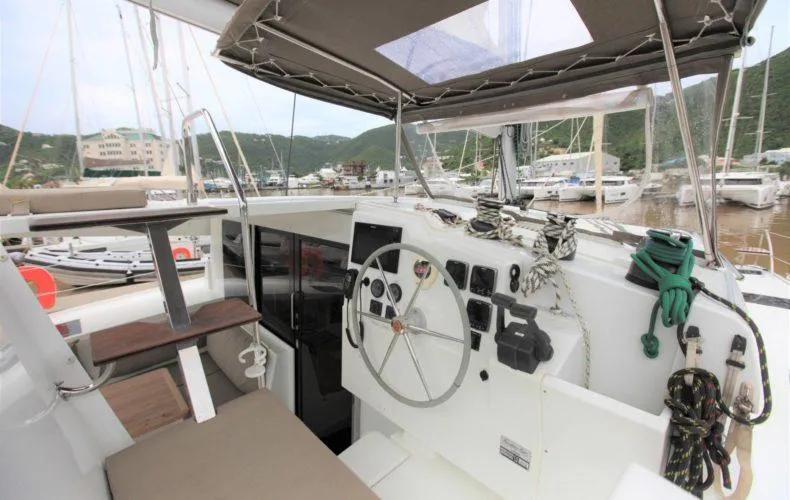 La Mer Kat Yacht Photos Pics Cockpit of 2016 Fountaine Pajot Lucia 40 catamaran in marina setting.