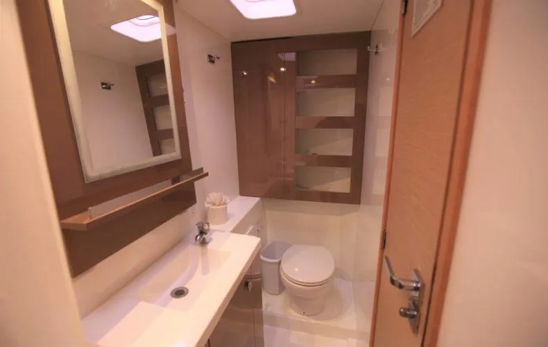 La Mer Kat Yacht Photos Pics Modern bathroom interior on 2016 Fountaine Pajot Lucia 40 catamaran, featuring sleek design and amenities.