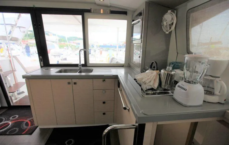 La Mer Kat Yacht Photos Pics Interior of 2016 Fountaine Pajot Lucia 40 catamaran kitchen with modern appliances.