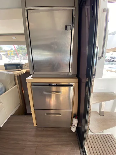 La Mer Kat Yacht Photos Pics Interior of a 2016 Fountaine Pajot Lucia 40 yacht, featuring stainless steel cabinetry.