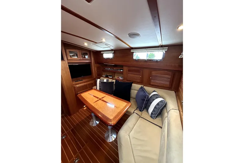  Yacht Photos Pics Luxurious interior of 2006 Sabre 38 Hard Top Express yacht with elegant wood finish.