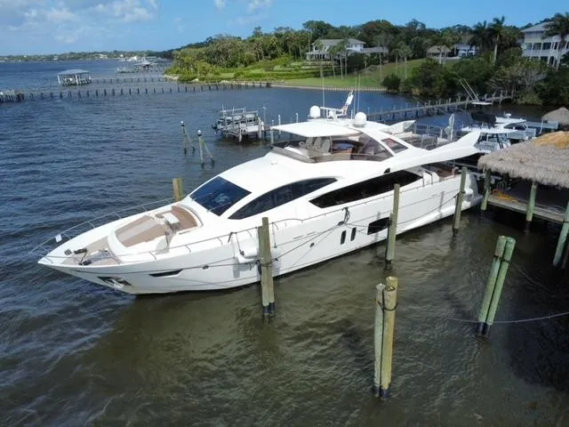  Yacht Photos Pics Luxury 2009 Astondoa 96 GLX yacht docked in scenic marina setting.