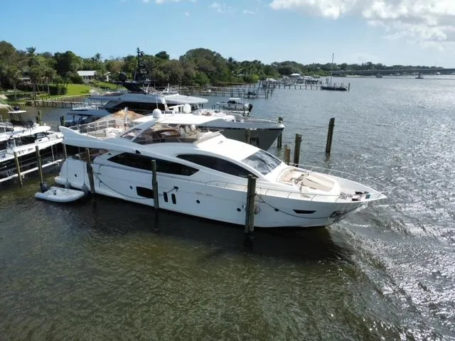  Yacht Photos Pics Astondoa 96 GLX 2009 yacht docked at marina, surrounded by water and boats.