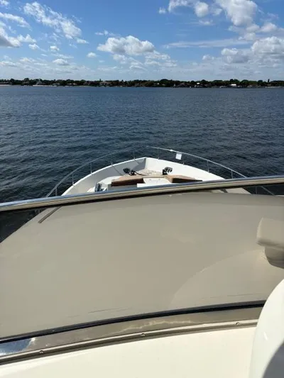 Yacht Photos Pics Astondoa 96 GLX yacht cruising on a calm lake under a blue sky, 2009 model.