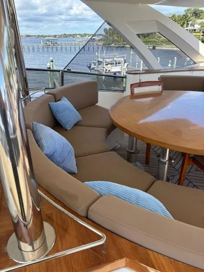  Yacht Photos Pics Luxurious seating area on a 2009 Astondoa 96 GLX yacht with scenic waterfront view.