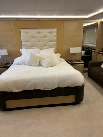  Yacht Photos Pics Luxurious bedroom interior on 2009 Astondoa 96 GLX yacht with elegant bedding and modern decor.