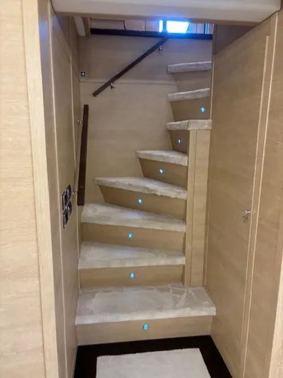  Yacht Photos Pics Staircase inside 2009 Astondoa 96 GLX yacht with modern lighting and wooden finish.